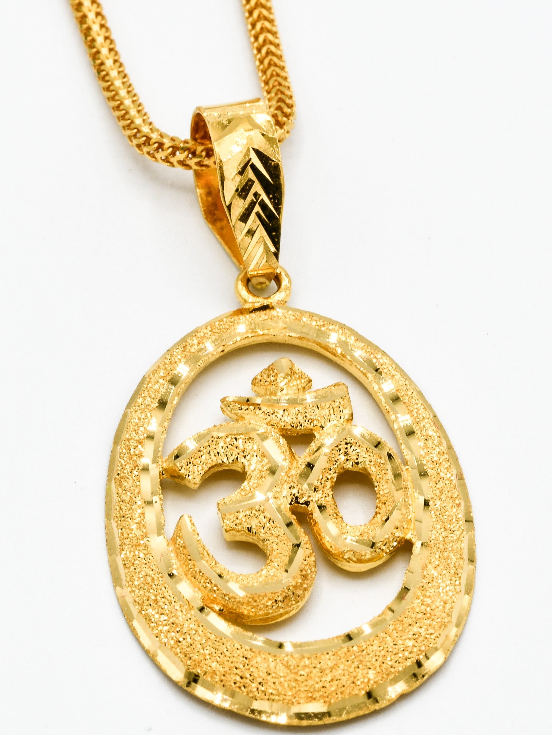 Gold om pendant deals for baby boy